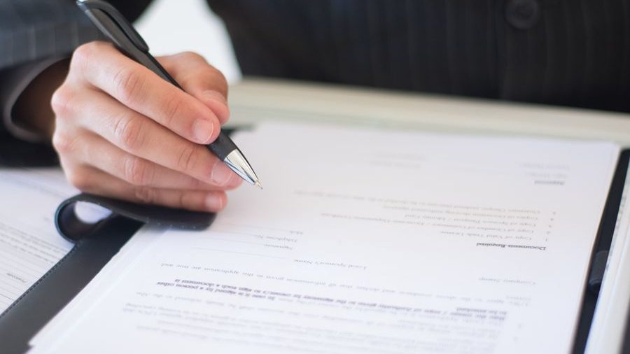 Signing a loan document