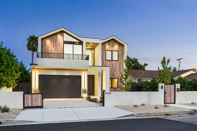 A modern two-storey Melbourne home at dusk